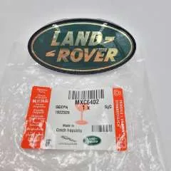 Genuine Land Rover Defender 90/110 Front Oval Grille Badge - Gold on Green MXC6402